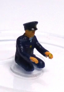 Sedící strojvůdce bez nohou H0